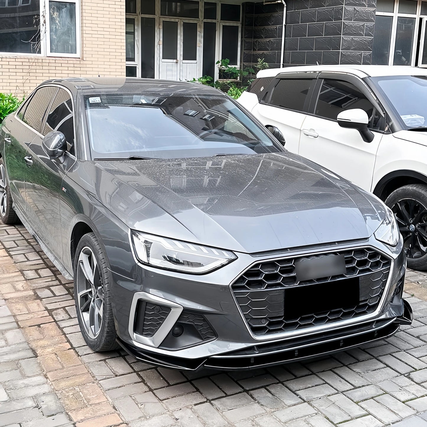 Lip delantero 3 piezas negro brillante para Audi A4 / S4 S-Line B9.5 (desde 2019)